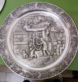 Piatti in peltro vintage