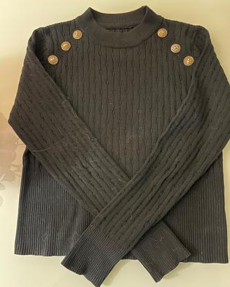 Maglia in filo colore nero con bottoncini oro lung