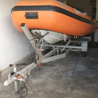 Carrello e Gommone 4,30 m da riparare con motore