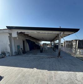 Tettoia in legno coibentata