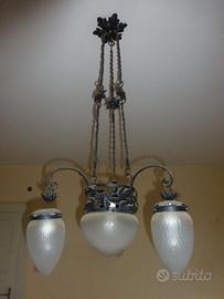 Lampadario antico in ferro battuto