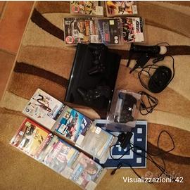 PlayStation 3 con giochi vari e controller