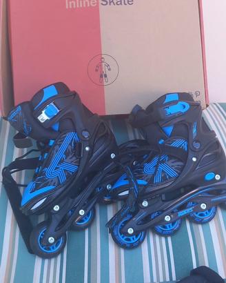 rollerblade, ginocchiere e casco usati poco