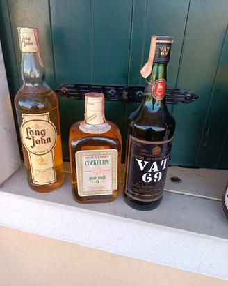 Tre bottiglie di whisky 