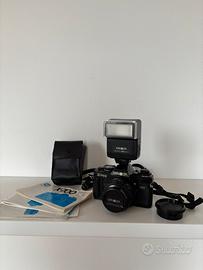 Minolta X-700 + 50mm f/1.7 + Flash Auto 280PX