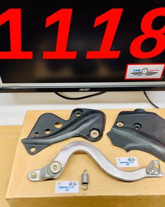 PEDALE FRENO E PROTEZIONI LATERALI TELAIO HUSQVARN