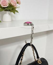 Gancio pieghevole rosa per borsa