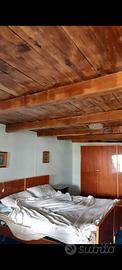 Rustisto con terreno in montagna