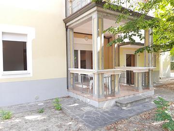 Appartamento con Terrazzo Abitabile e Posto Auto