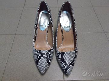 Scarpe maculate bianco/nero n. 37