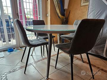 Tavolo tondo allungabile in cristallo + 4 sedie