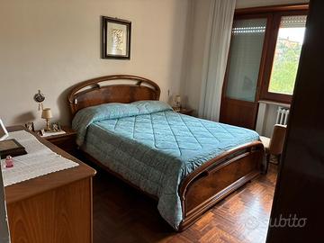 Camera da letto stile classico