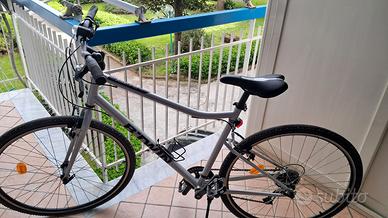 Bici trekking RIVERSIDE 120 grigia + sostegno