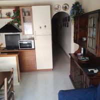 Delizioso bivani arredato con terrazzo a livello