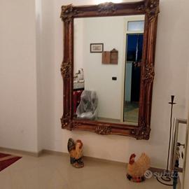 Cornice Specchiera in legno, doratura foglia oro.