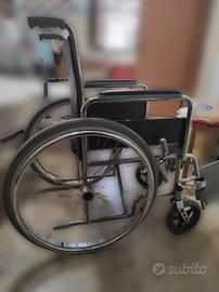 carrozzina con autospinta