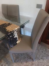 tavolo in vetro con 5 sedie