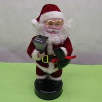 Babbo Natale musicale con lanterna o candela che b