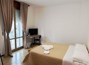 Stanza singola con letto matrimoniale