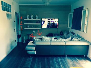 Mensole in legno per parete salotto