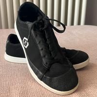 Scarpe Footwork con pallone da freestyle
