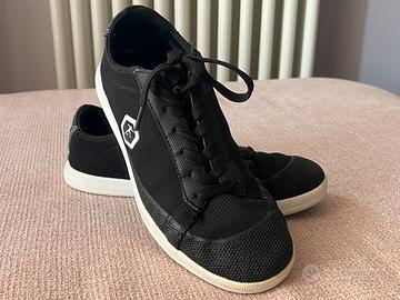 Scarpe Footwork con pallone da freestyle