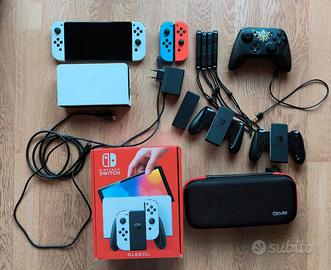Switch Oled + 2 Joycon + Pro controller + 3 Giochi