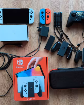 Switch Oled + 2 Joycon + Pro controller + 3 Giochi