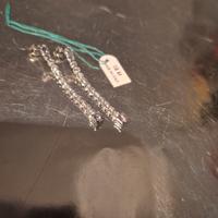 Orecchini in oro bianco a tennis