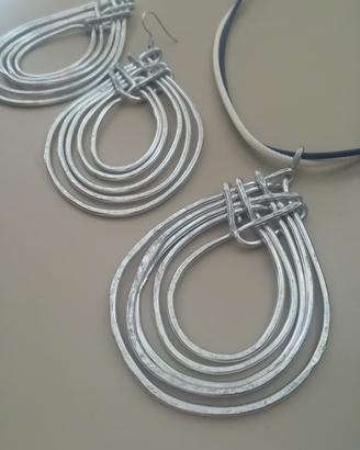 Parure artigianale in alluminio