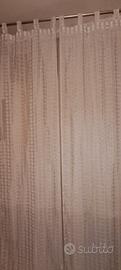 Due lunghe tende grigio perla trasparenti 240x70