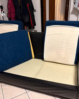 Divano in pelle con cuscinoni