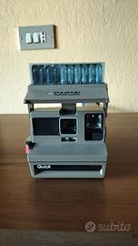 Polaroid Quick 610 con flash Sylvania.