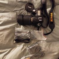 Nikon  D90 con zoom 