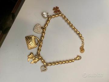Bracciale dorato donna con charm pendenti