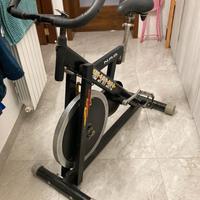 Spin-bike, trazione a catena, doppia sella.