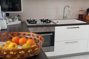 Bifamiliare sovrapposta con giardino orto e garage