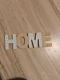 scritta in legno "home"