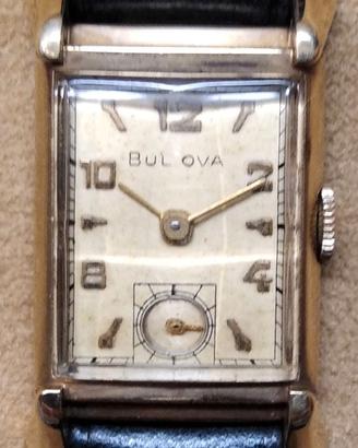 Orologio Bulova 1947 manuale, oro 10K, mod. lungo