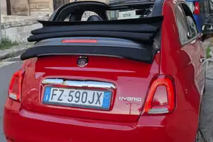 Fiat 500 cabrio rossa tenuta come un gioiello