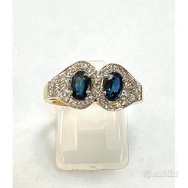 Anello in oro con diamanti e zaffiri