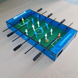 Calcio Balilla e un monopattino per bambini