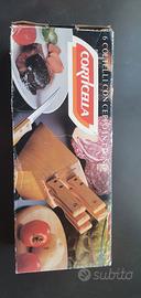ceppo in legno e coltelli