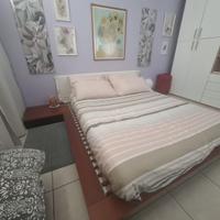 Letto Flou in legno con comodini
