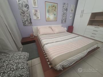 Letto Flou in legno con comodini
