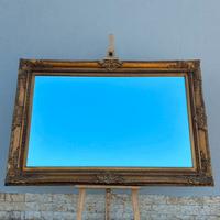 Grande specchiera stile barocco.