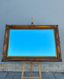 Grande specchiera stile barocco.