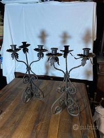 Antichi candelieri in ferro battuto del 1800