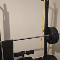 Rack con bilanciere e pesi