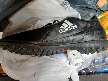 scarpe uomini e donna e portafogli 